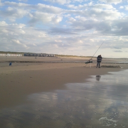 eenzame visser bij Slaapzand